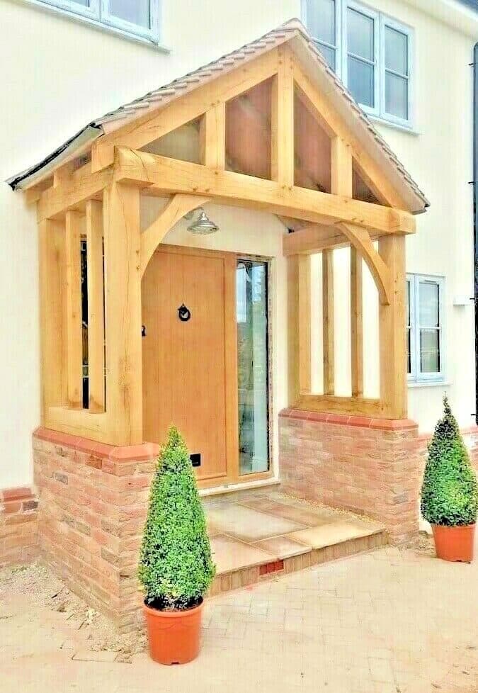 The Broadway oak porch from the side, showing the enclosed brick side screens
