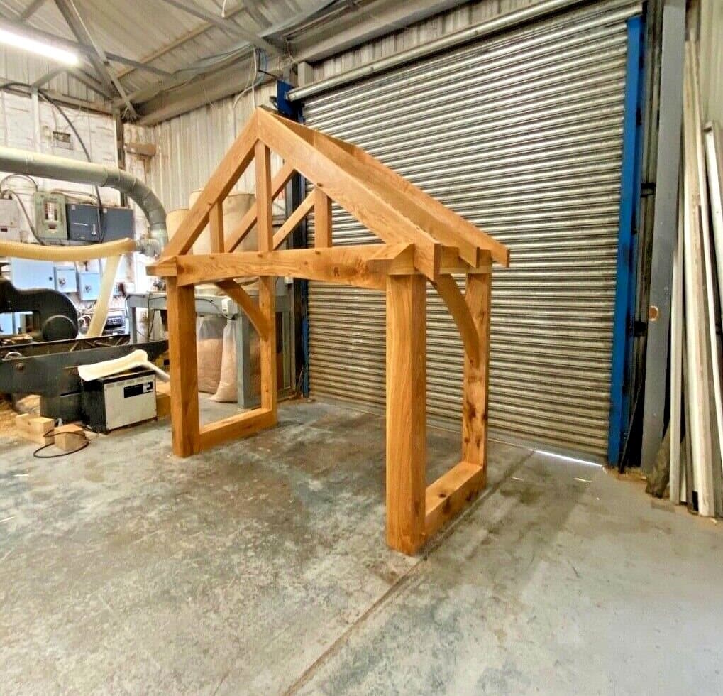 A Malvern oak porch frame from the side, dry-fitted with pegs in our workshop